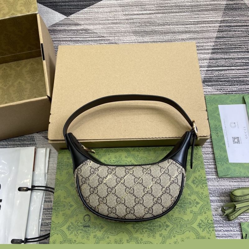 G*u*i top handle bags